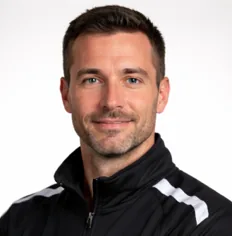 Coach on pitch